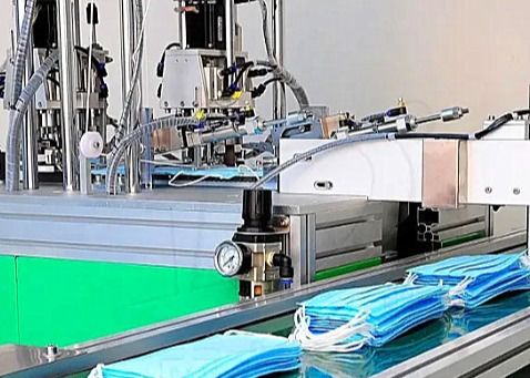 الصين آلة صنع قناع الغبار متعدد الطبقات للوجه باستخدام آلة الكشف الكهروضوئي المزود